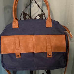 Brown leather and blue Jean bag.      948