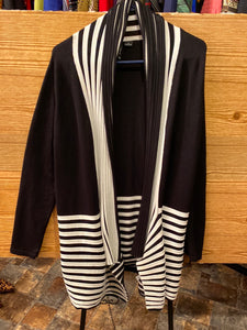 New direction black and white sweater. Size small can fit up to 16. #93