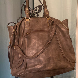 Nicole Miller leather brown purse.     901